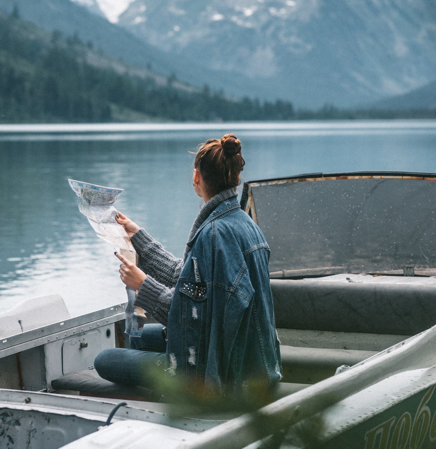 Woman in boat looking at distance