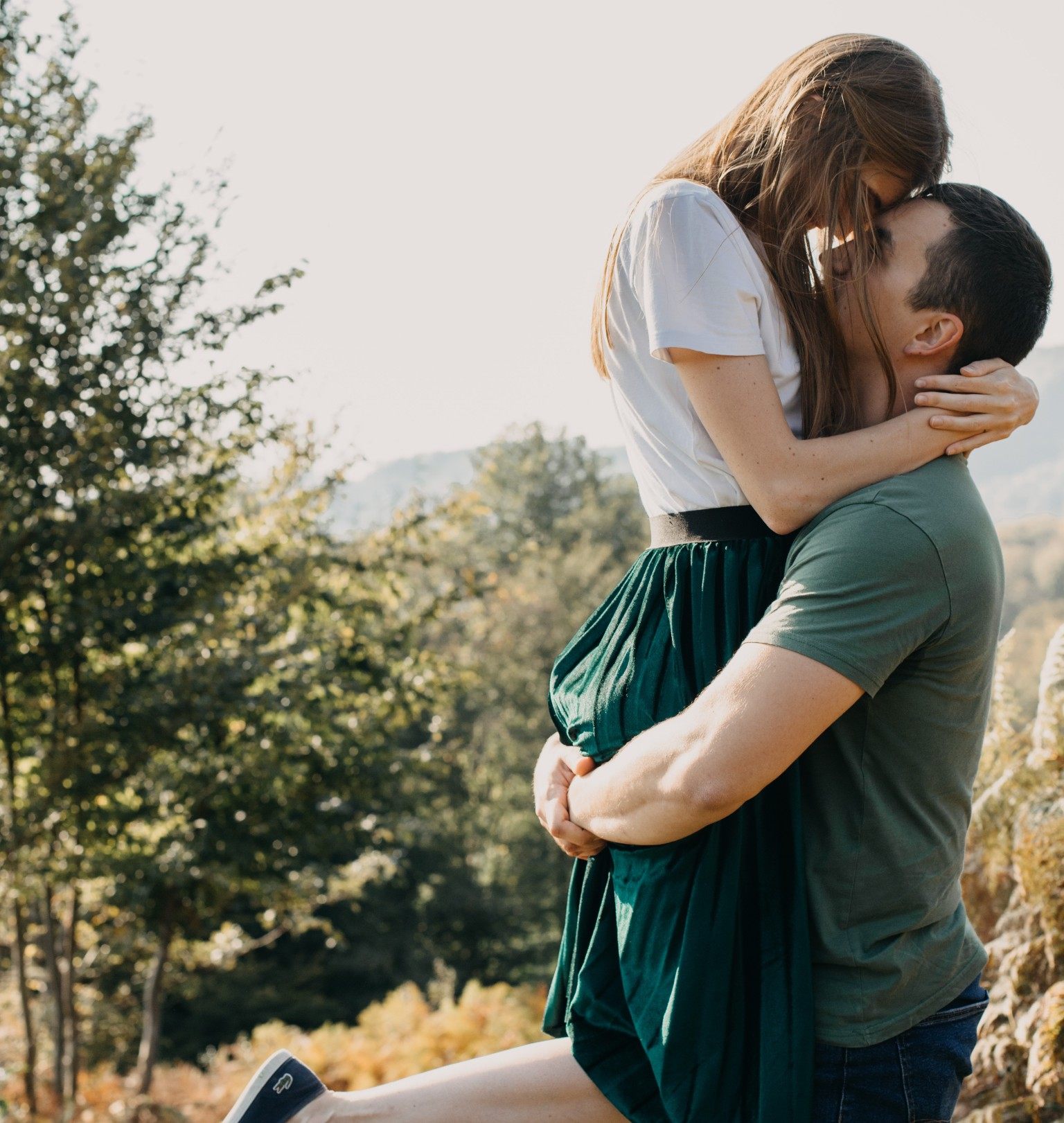 Couple hugging in nature