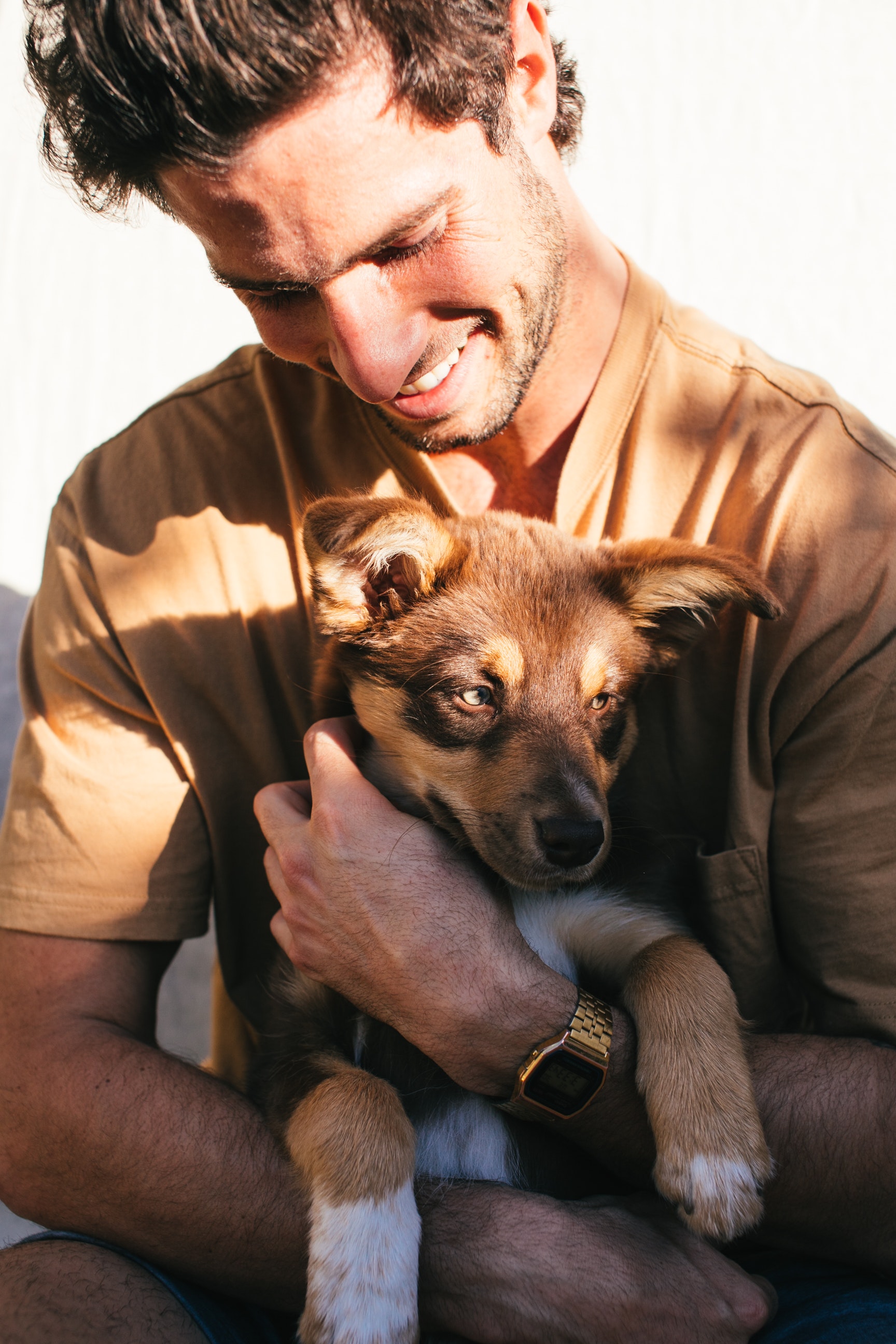 Man holding dog